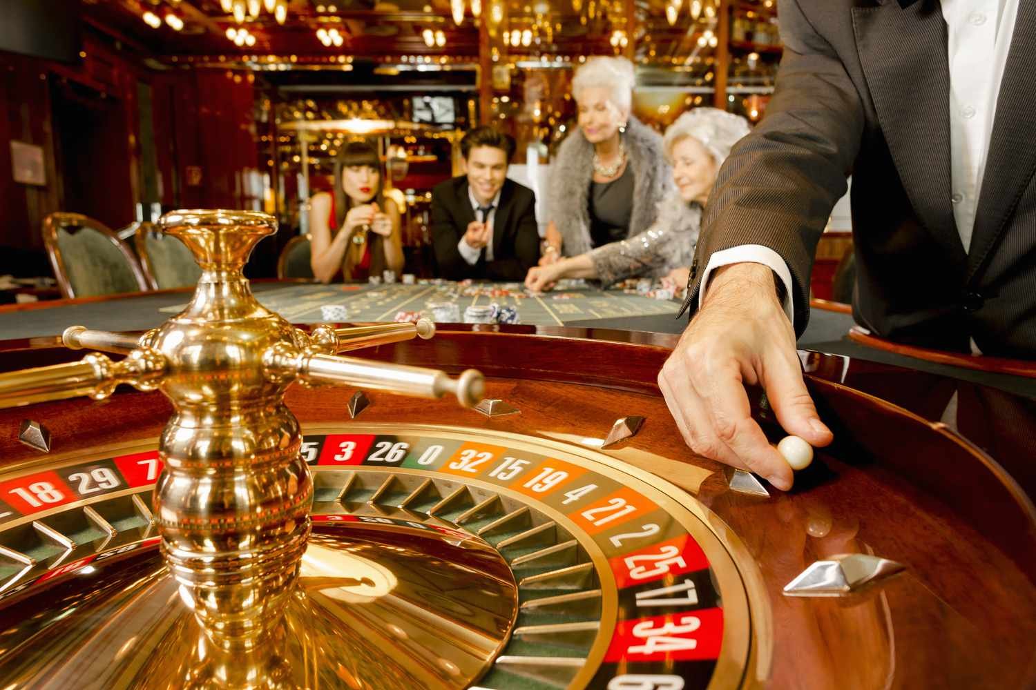 Tampilan permainan kasino online kudetabet menunjukkan tabel dan slot
